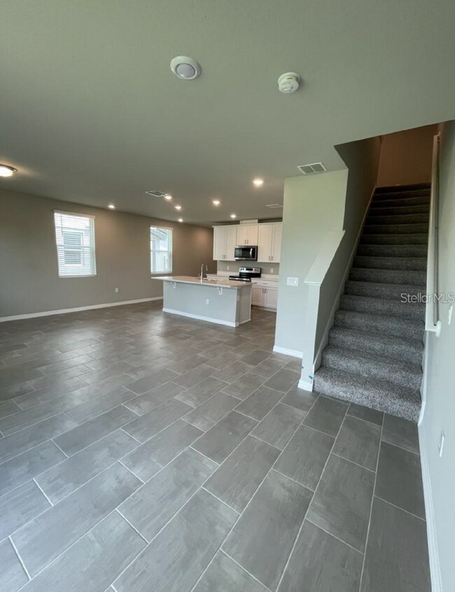 Building Photo - Beautiful corner unit townhouse features an abundance of natural light.