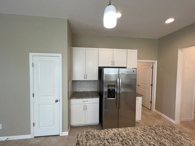 Building Photo - 55+ community in Four Seasons of Orlando 2 bedroom, 2 bathroom, with a 2 stall attached garage on...