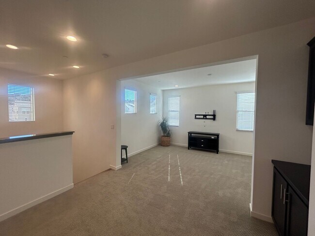 Building Photo - Modern 4 Bedroom Home with Downstairs Suite, Owned Solar & Resort-Style HOA Amenities