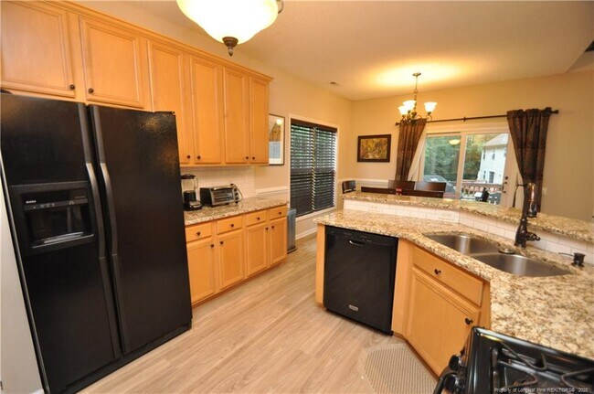 Building Photo - 5633 Yates Garden Ln
