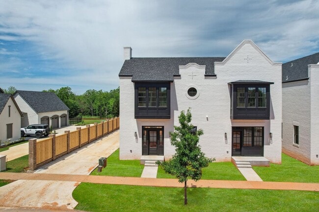 Building Photo - Classic Cape Cod Meets Modern Glam: Your D...