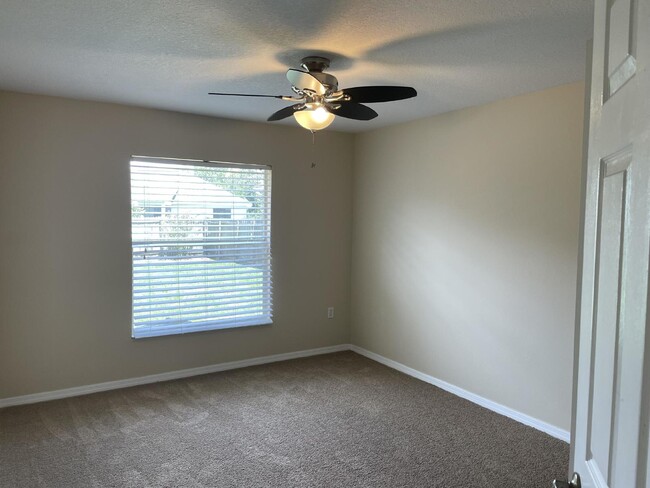 Building Photo - Beautiful 3 Bedroom 2 Bath Pool Home Lawn ...