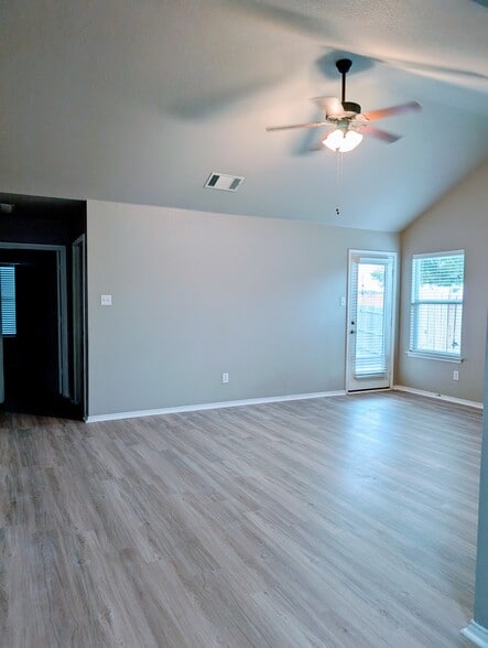 Living Room with Door to Back Patio - 525 Oxford Loop