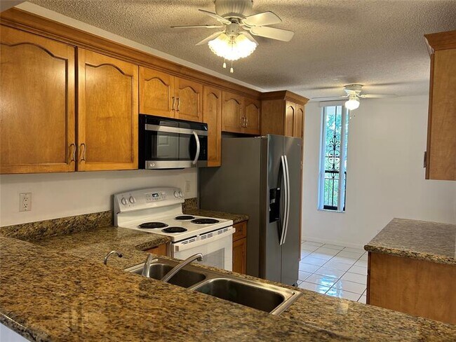 Building Photo - 6123 Coral Lake Dr