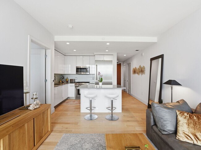 Building Photo - Designer-Furnished Waterfront Living at VIO Condominiums!