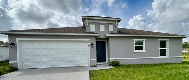 Primary Photo - BEAUTIFUL 4/2 HOME IN PALM BAY