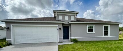 Building Photo - BEAUTIFUL 4/2 HOME IN PALM BAY