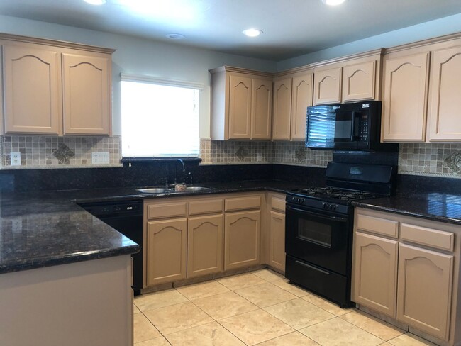 Building Photo - 2 Weeks Free! 4 Bedroom, 2.5 Bathroom Ston...