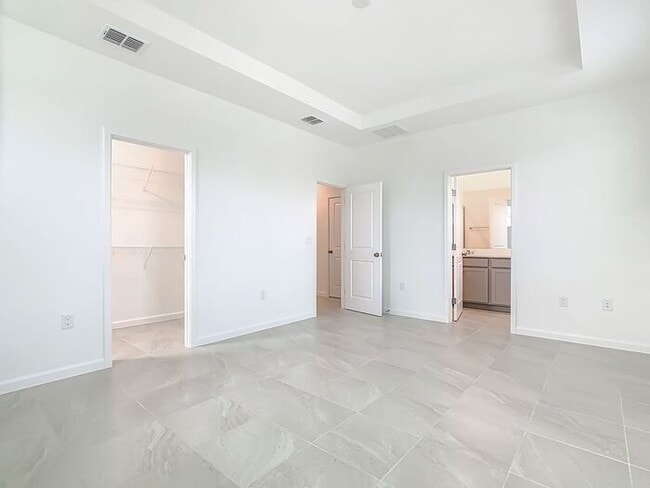 Building Photo - Brand New Luxury Town House in Island Village a Celebration, FL maintenance free community.