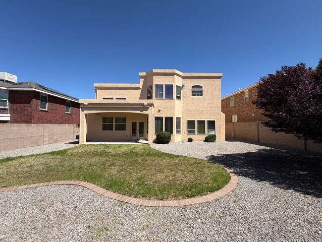 Building Photo - 4 Bedroom Home Plus Office Available Near Eubank Blvd NE & Paseo Del Norte!