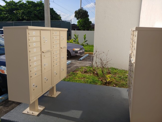 Mailboxes with package bins - 6130 W 21st Ct