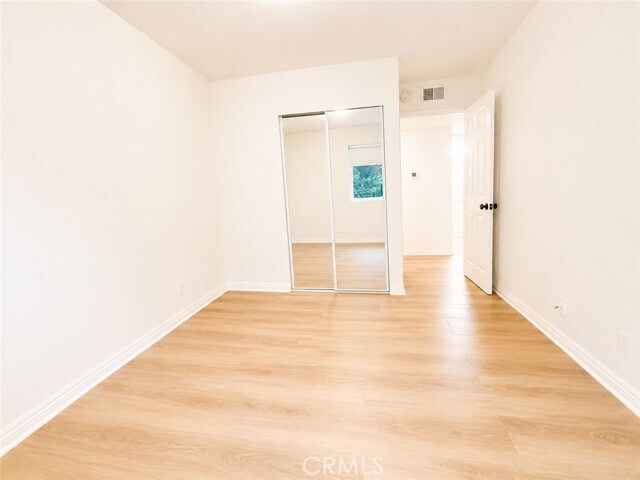 Building Photo - 10636 Woodley Ave
