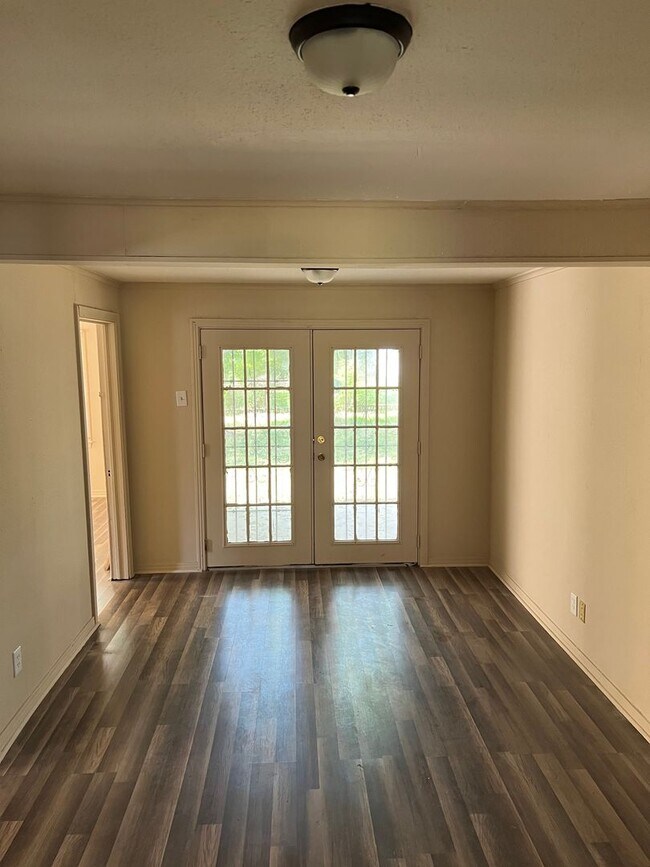 Building Photo - Large 3 bedroom, 2 bath with refrigerator!