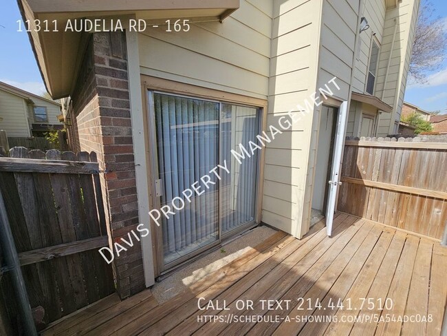 Building Photo - 2 story condo, cov parking, patio, full wa...