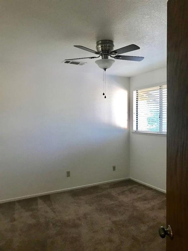 Building Photo - Beautifully Updated 2 Bed 1.5 Bath Condo in Merced Gated Community - Private Backyard! Community ...