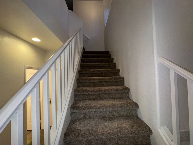 Building Photo - Fresh Paint/New Flooring all inside! Four ...