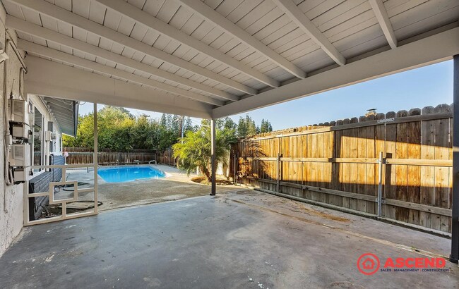 Building Photo - Beautiful 3 Bed, 2 Bath Home with Pool, Solar & Cozy Fireplace