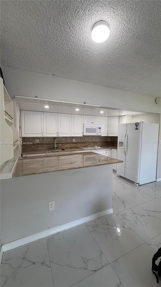 Building Photo - 17600 NW 68th Ave