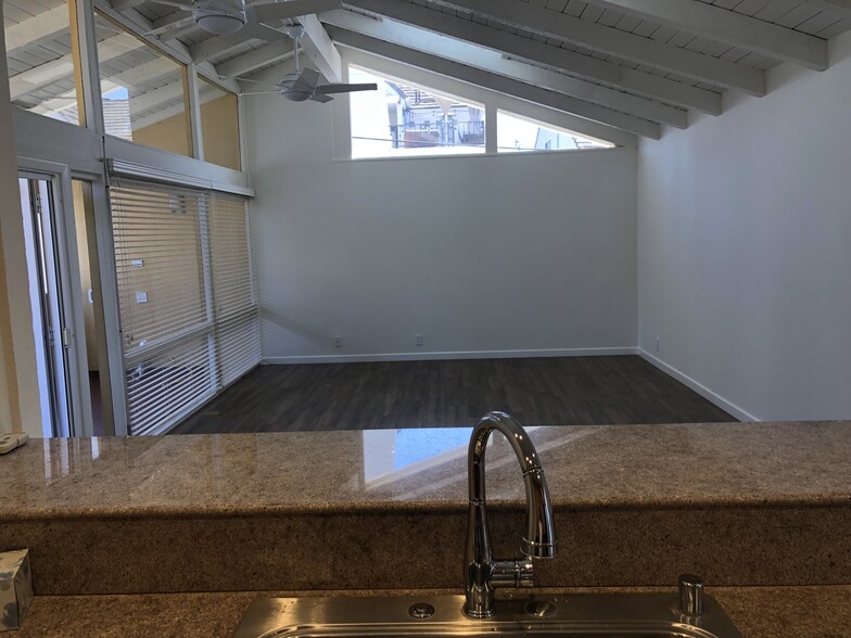 view from kitchen to main living area - 518 Dahlia Ave