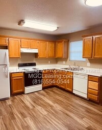 Building Photo - Grain Valley Ranch Duplex: Available September 1st
