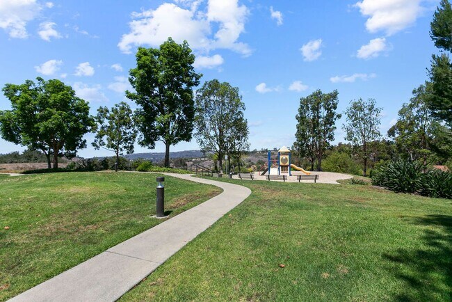 Building Photo - Move-In Special - 50% Off First Month’s Rent! Beautiful End Unit Condo with Overlook of Park and ...