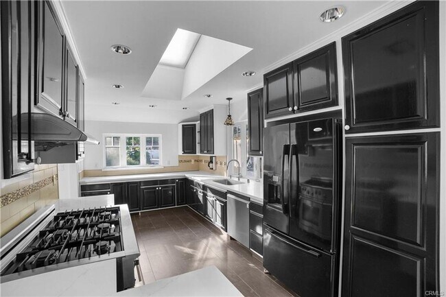 Building Photo - Tucked away behind gorgeous grand gates is this beautifully updated 3 bedroom 2 bath home