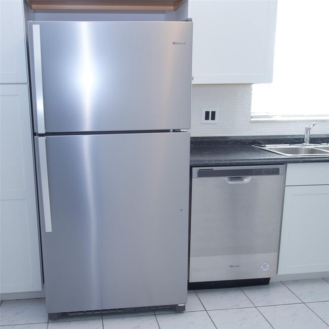 Building Photo - 7355 Woodmont Terrace