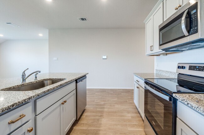 Building Photo - 4-BEDROOM NEW CONSTRUCTION IN SWENSON HEIG...