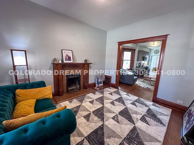 Building Photo - A home where old-world charm meets modern sophistication!