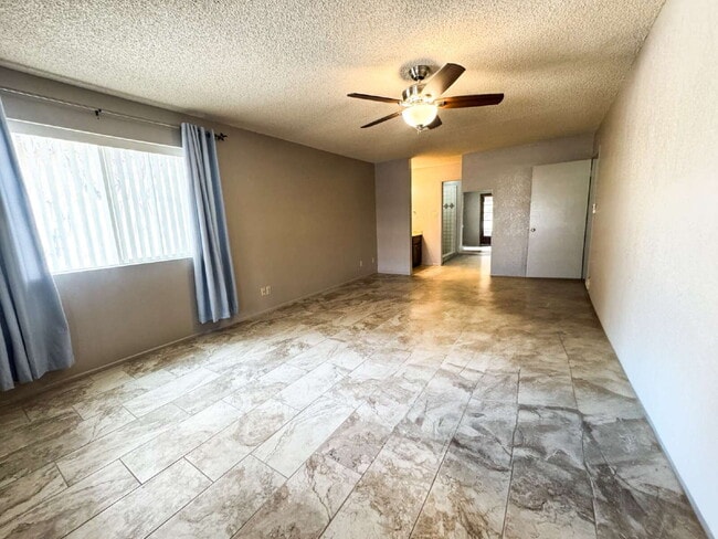 Building Photo - "Charming 3-Bed Oasis with 2 Baths and 170...