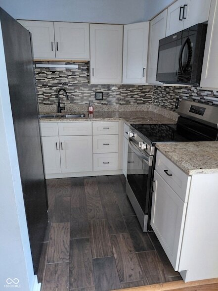 Building Photo - 4454 Greenmeadow Cir