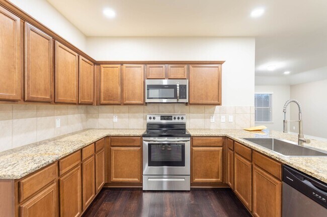 Building Photo - Located in the Trails at Riverstone community, this inviting 5-bedroom, 2-bathroom home offers a ...