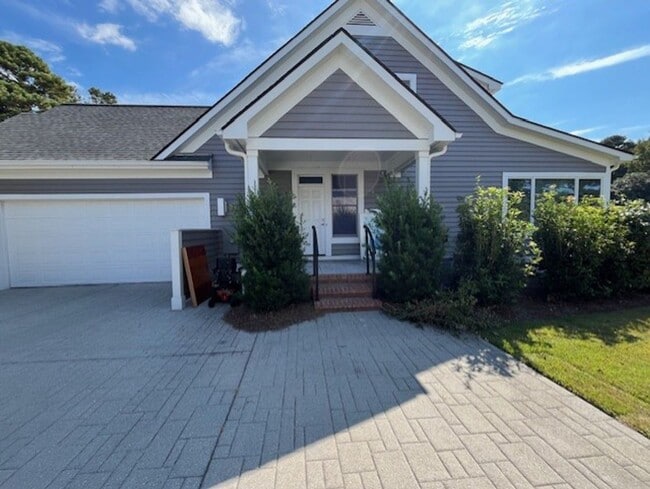 Building Photo - Welcome to Elegant Living in the Charming Porters Neck Plantation Community!