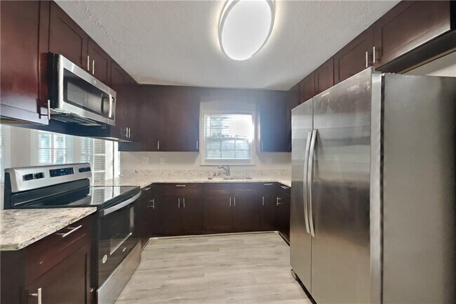 Building Photo - 1704 Cum Laude Way