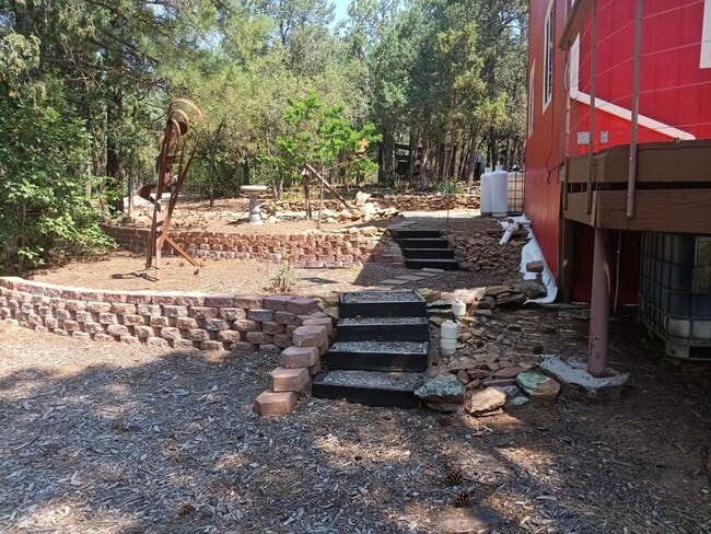 Building Photo - COZY HOME IN THE BEAUTIFUL TOWN OF TIJERAS | Showings available NOW!!