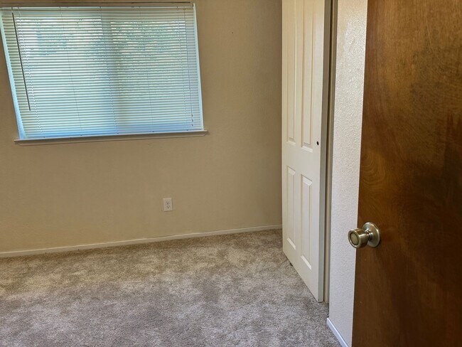 Building Photo - Charming Redding Home with Fireplace & Vau...