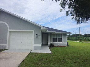 Building Photo - 3 bedroom 2 bath 1 car garage duplex