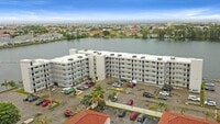 Building Photo - 9917 W Okeechobee Rd