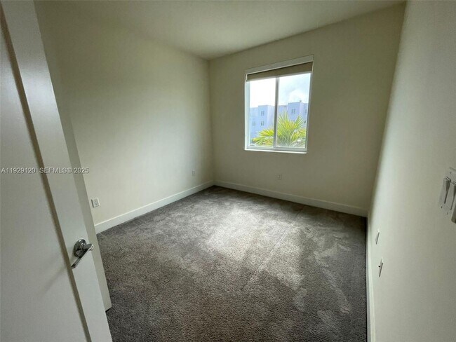 Building Photo - 6416 NW 102nd Ct