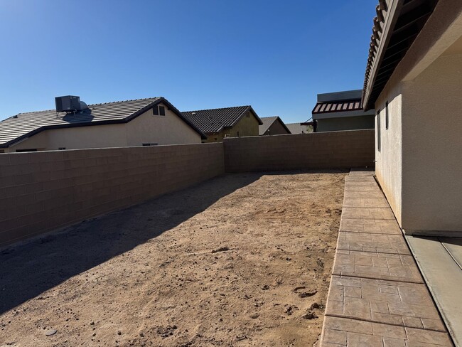 Building Photo - Fenced Three Bedrooom Home with covered pa...