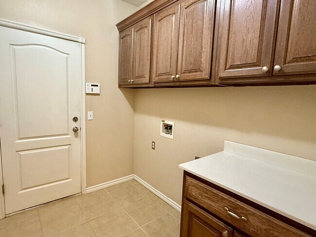 Building Photo - Beautiful Home in Surrey West of Yukon with Pool Access and Lawncare Included