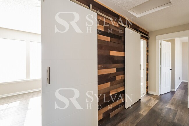 Building Photo - This lovely 4BR, 2.5BA home is move-in ready