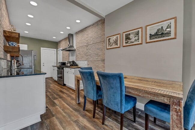 Building Photo - Furnished 1-Bedroom Lower Apartment on Main St