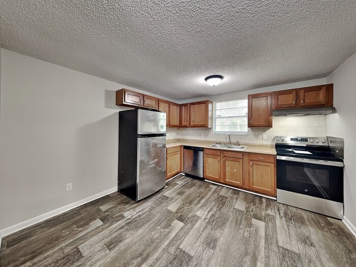 Building Photo - 7627 Mc Cowan Dr