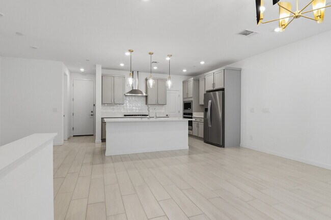 Building Photo - Experience refined living in this beautifully appointed 3-bedroom, 2.5-bathroom townhome spanning...