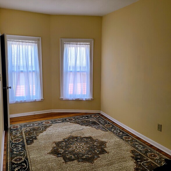 2nd Bedroom, carpet, curtains, large closet - 715 N McBride St