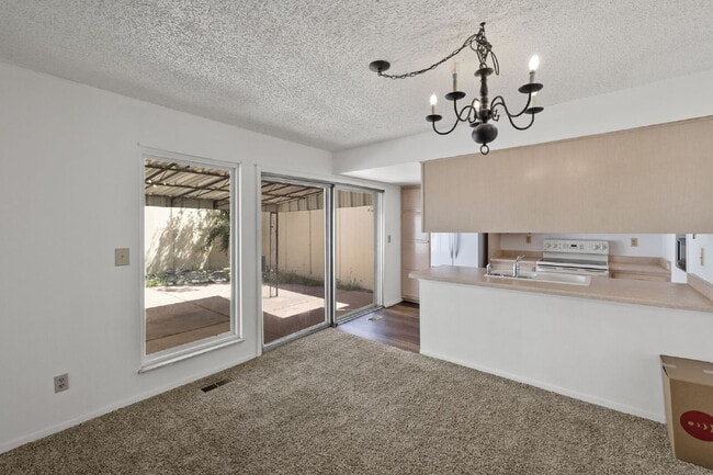Building Photo - Close to Fort Carson and Cheyenne Mountain, 3 bedroom townhome with 2 car garage.