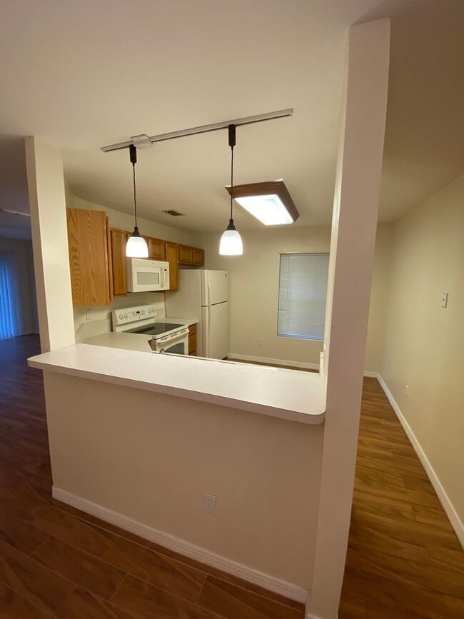 Building Photo - One-Story End Unit Oasis Backing to Preserve - No Carpet + Plantation Amenities!!