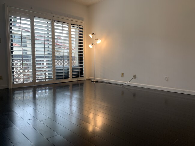 Living room and balcony. - 8180 Manitoba St