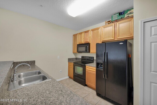 Building Photo - 8241 Pelican Landing Rd